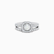 The Pave Classica 14K White Gold Diamond Engagement & Wedding Ring Set 1.34 TCW features a round center diamond, a sparkling diamond halo, and additional diamonds on the split band, shown against a white background.