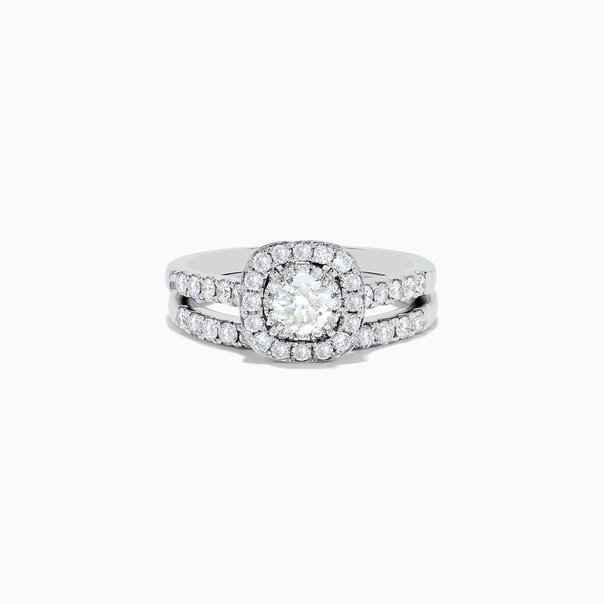 The Pave Classica 14K White Gold Diamond Engagement & Wedding Ring Set 1.34 TCW features a round center diamond, a sparkling diamond halo, and additional diamonds on the split band, shown against a white background.