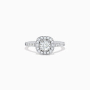 The Pave Classica 14K White Gold Diamond Engagement & Wedding Ring Set 1.34 TCW features a round center diamond, a sparkling diamond halo, and additional diamonds on the split band, shown against a white background.