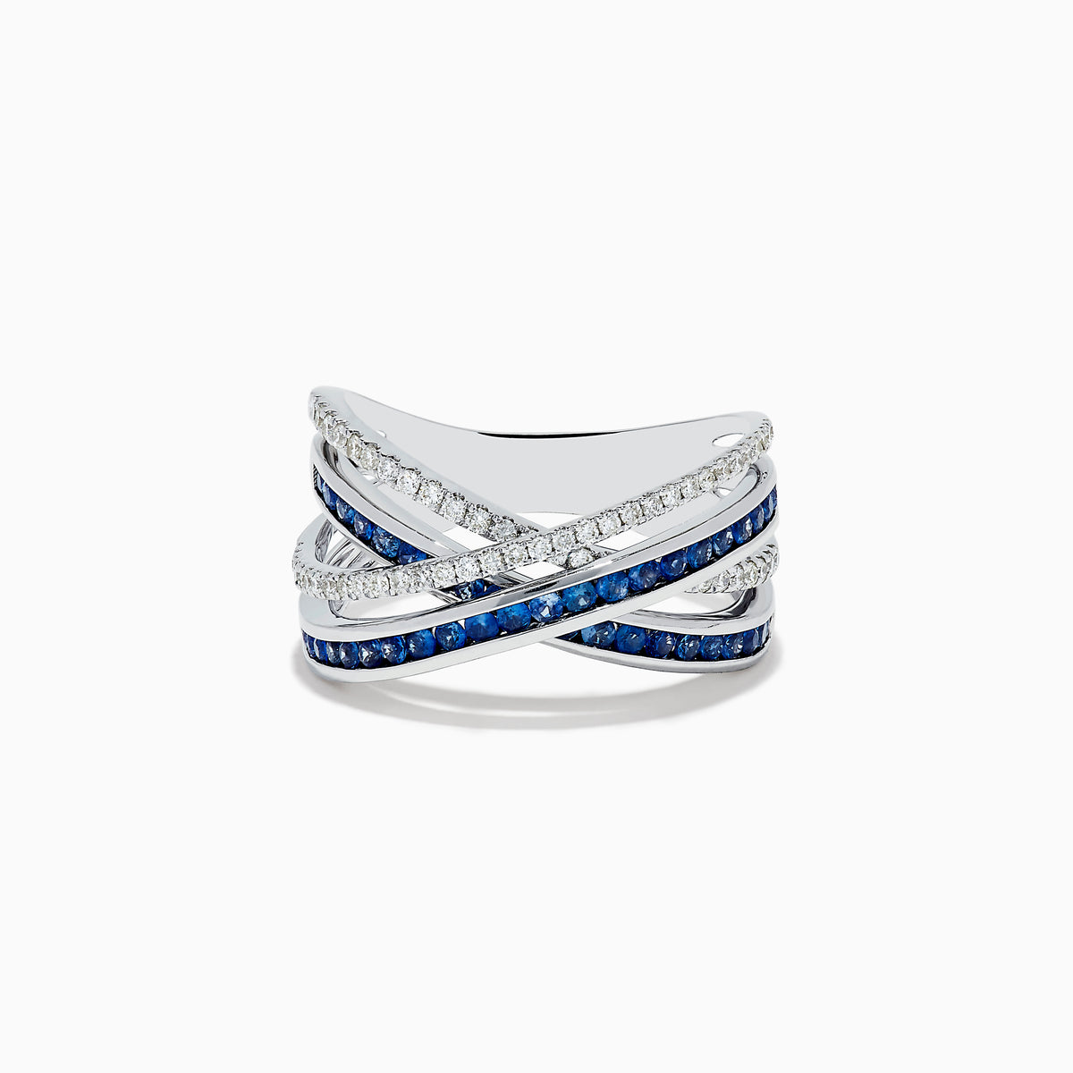 The 14K White Gold Blue Sapphire and Diamond Crossover Ring features overlapping bands adorned with sparkling diamonds and vivid blue sapphires in an elegant crisscross design, shown on a white background.