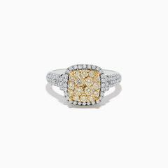The Canare Two Tone Gold Cushion Shaped Cluster Yellow Diamond Ring 1.19 TCW features a vibrant yellow diamond cluster at the center, framed by white diamonds and accented with more diamonds along the band.
