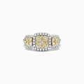 The Canare 14K Two Tone Gold Yellow Diamond Cushion Shaped Cluster Ring features a large cushion-cut yellow diamond, smaller round yellow diamonds, and a halo of white diamonds on a diamond-encrusted band; total carat weight 1.10.
