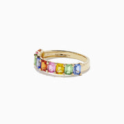 The Watercolors 14K Yellow Gold Multi Sapphire Ring, 2.22 TCW, showcases a row of rectangular pink, blue, green, yellow, and orange sapphires in a continuous band design.