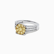 The Canare 14K 2-Tone Gold Yellow Diamond Bouquet Ring, 1.00 TCW, features a central cluster of yellow diamonds and sparkling accents on a triple-row split band for dazzling brilliance.