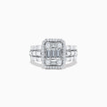 The Classique 14K White Gold Diamond Ring features a rectangular cluster of baguette diamonds, a diamond halo, and square-set diamonds on the band, offering timeless elegance.