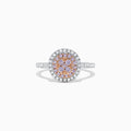 The 14K Two Tone Gold Pink and White Diamond Ring, 0.57 TCW, features a central pink diamond cluster surrounded by double white diamond halos and diamond accents along the band.