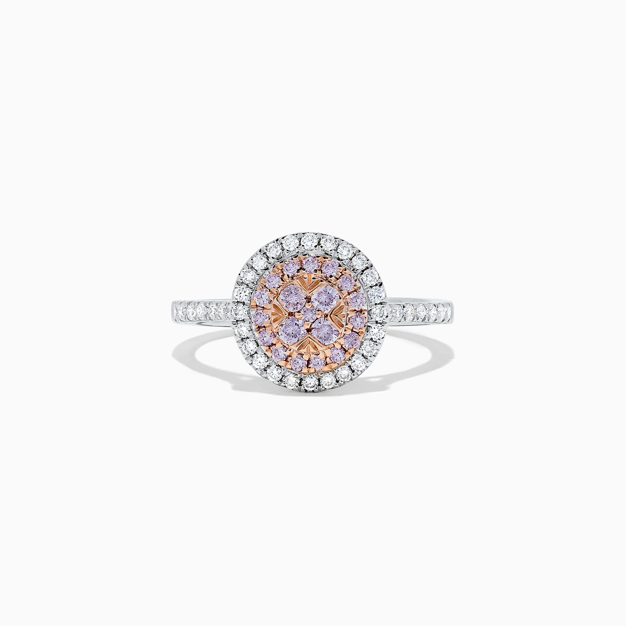 The 14K Two Tone Gold Pink and White Diamond Ring, 0.57 TCW, features a central pink diamond cluster surrounded by double white diamond halos and diamond accents along the band.