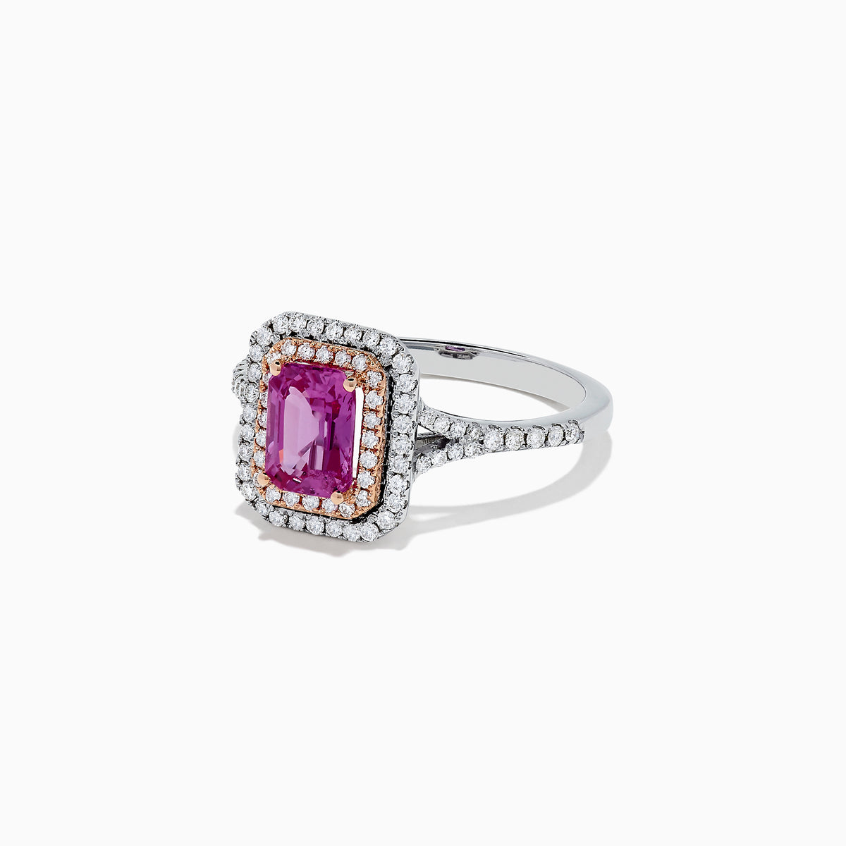The 14K Two Tone Gold Pink Sapphire and Diamond Ring, 1.43 TCW, features a rectangular pink sapphire with a double halo of white diamonds, set on a two-tone band and displayed against a plain white background.