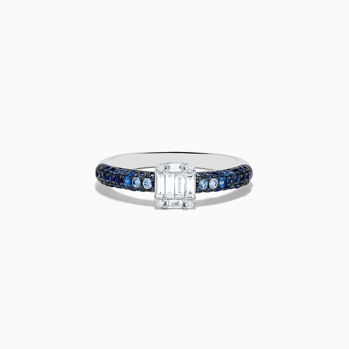 The Royale Bleu 14K White Gold Sapphire and Diamond Ring features a rectangular emerald-cut diamond centerpiece with round blue sapphires along the band, creating an elegant and symmetrical look. Shown photographed on a white background.