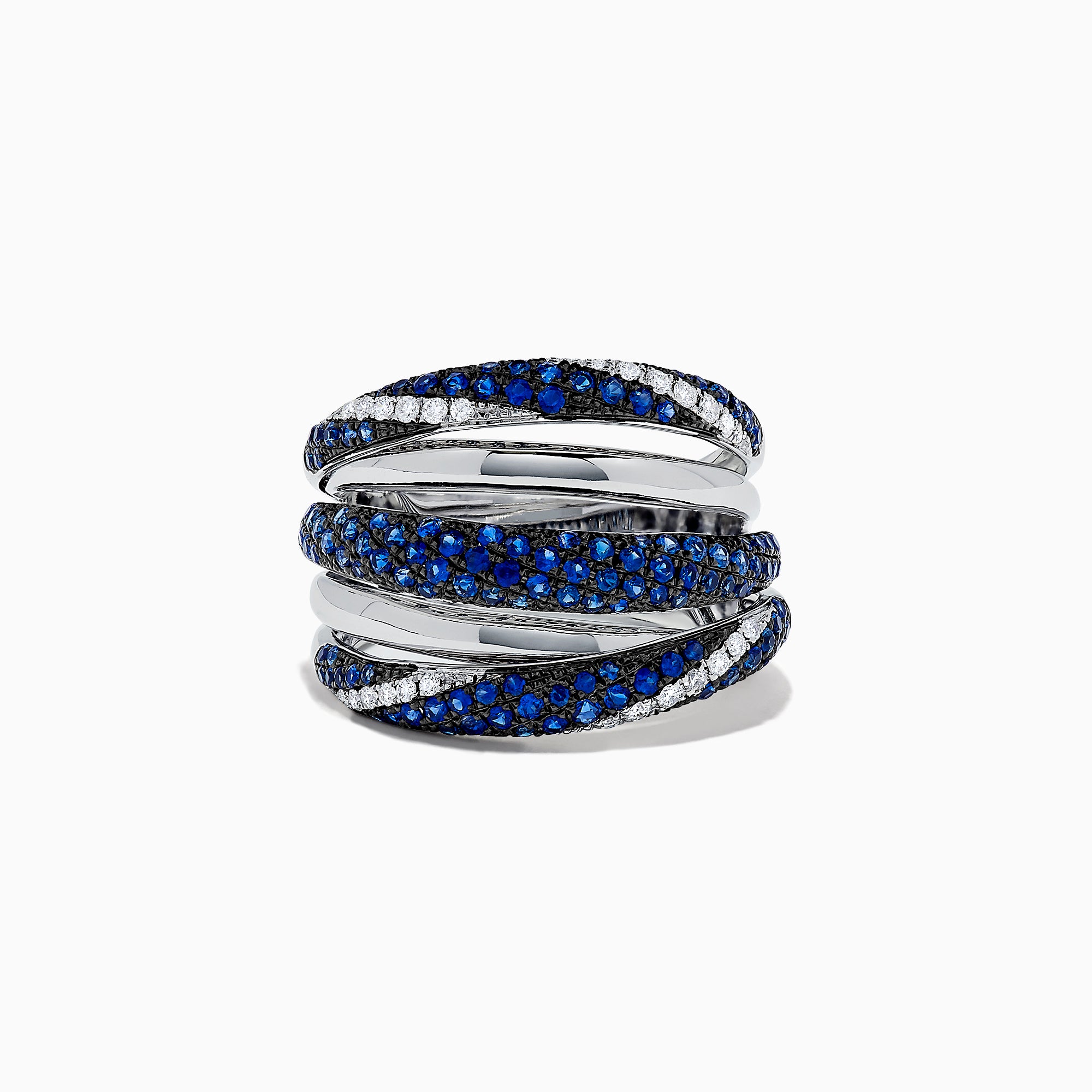 A 14K White Gold ring featuring overlapping bands with blue sapphires and white diamonds, evoking elegance and intricacy like the Royale Bleu 14K White Gold Sapphire and Diamond Ring, 1.04 TCW.