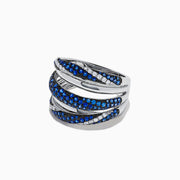 A 14K White Gold ring featuring overlapping bands with blue sapphires and white diamonds, evoking elegance and intricacy like the Royale Bleu 14K White Gold Sapphire and Diamond Ring, 1.04 TCW.