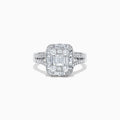 The Classique 14K White Gold Diamond Ring features a large rectangular cluster of emerald-cut and round diamonds, with additional diamonds along the split shank band, set against a white background.