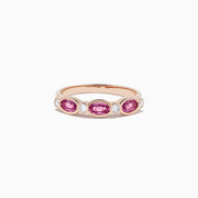 A 14K rose gold ring featuring pink sapphires and diamonds, 0.88 total carat weight.