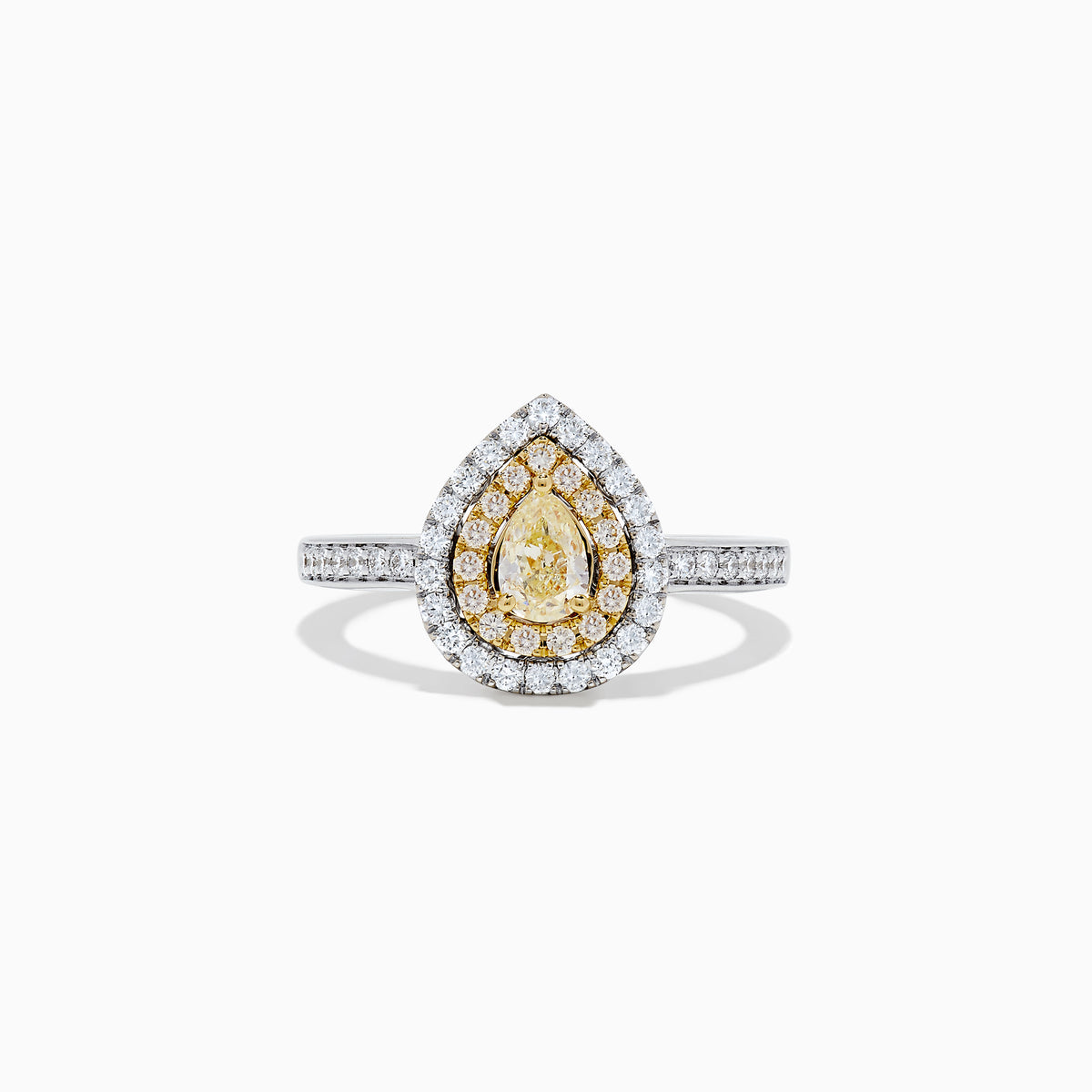 The Canare 14K Two Tone Gold Yellow and White Diamond Ring features a pear-shaped yellow diamond with a double halo of white and yellow diamonds, set on a two tone gold band adorned with small round diamonds.