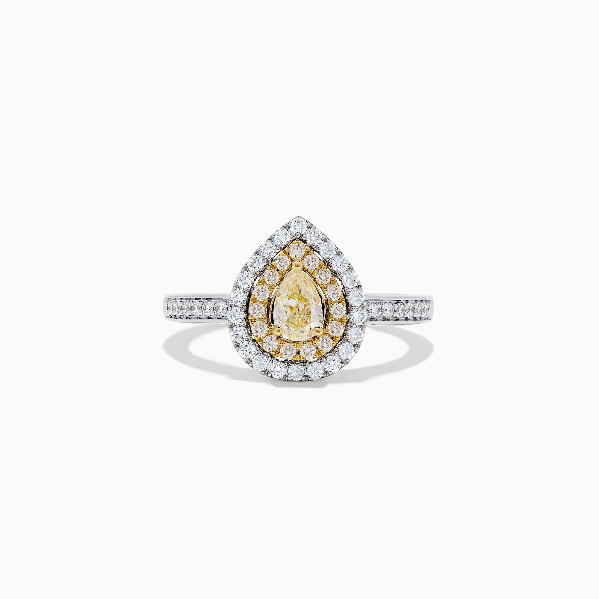 The Canare 14K Two Tone Gold Yellow and White Diamond Ring features a pear-shaped yellow diamond with a double halo of white and yellow diamonds, set on a two tone gold band adorned with small round diamonds.