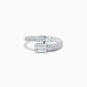 The Classique 14K White Gold Diamond Bypass Ring (0.65 TCW) features an emerald-cut center diamond accented by round diamonds along its split band, blending elegance and sparkle in a refined design.
