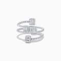 The Classique 14K White Gold Diamond Ring features three spiral bands with square clusters of baguette-cut diamonds and round diamonds along each band, all beautifully set in polished white gold.