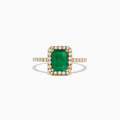 The Brasilica 14K Yellow Gold Emerald and Diamond Ring, 1.69 TCW, showcases a rectangular green emerald center surrounded by a halo of round diamonds with additional diamonds set along the band.