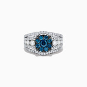 The Bella Bleu 14K White Gold Blue and White Diamond Ring, 2.16 TCW, features a striking cluster of round blue gemstones at the center with sparkling diamonds along its split shank band, shown on a white background.