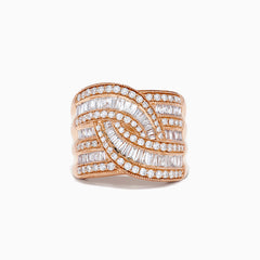 The 14K Rose Gold Diamond Crossover Ring features wavy rows of baguette and round diamonds in a woven, overlapping design that sparkles elegantly on a white background.