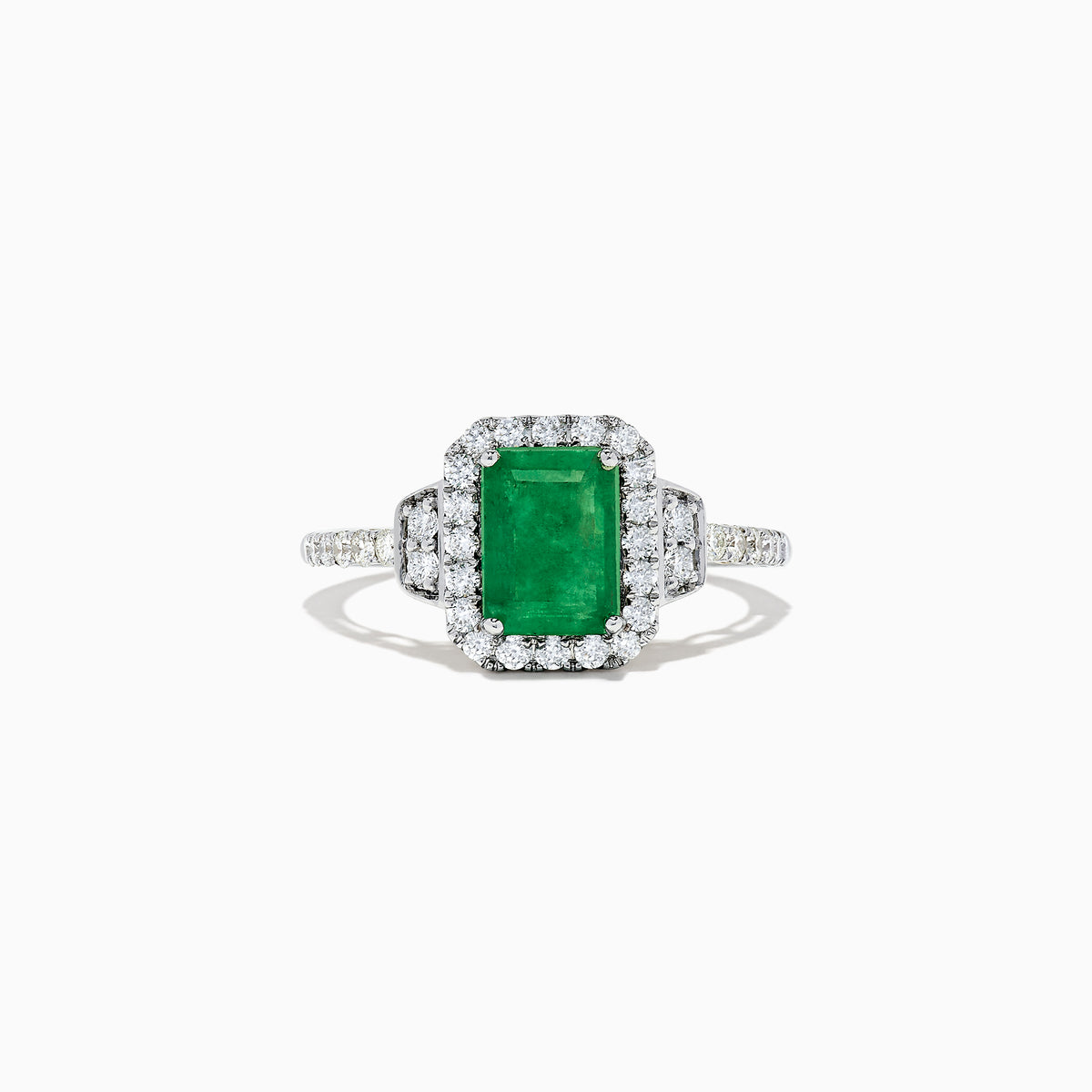 The Brasilica 14K Two Tone Gold Emerald and Diamond Ring, 1.90 TCW, features a striking rectangular emerald center, encircled by round diamonds and further accented with diamonds along the gold band.