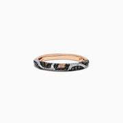 The Signature 14K Rose Gold Diamond Panther Spot Ring, 0.47 TCW, showcases alternating diagonal stripes of black and white diamonds for a bold yet elegant look against luxurious rose gold.