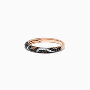 The Signature 14K Rose Gold Diamond Panther Spot Ring, 0.47 TCW, showcases alternating diagonal stripes of black and white diamonds for a bold yet elegant look against luxurious rose gold.