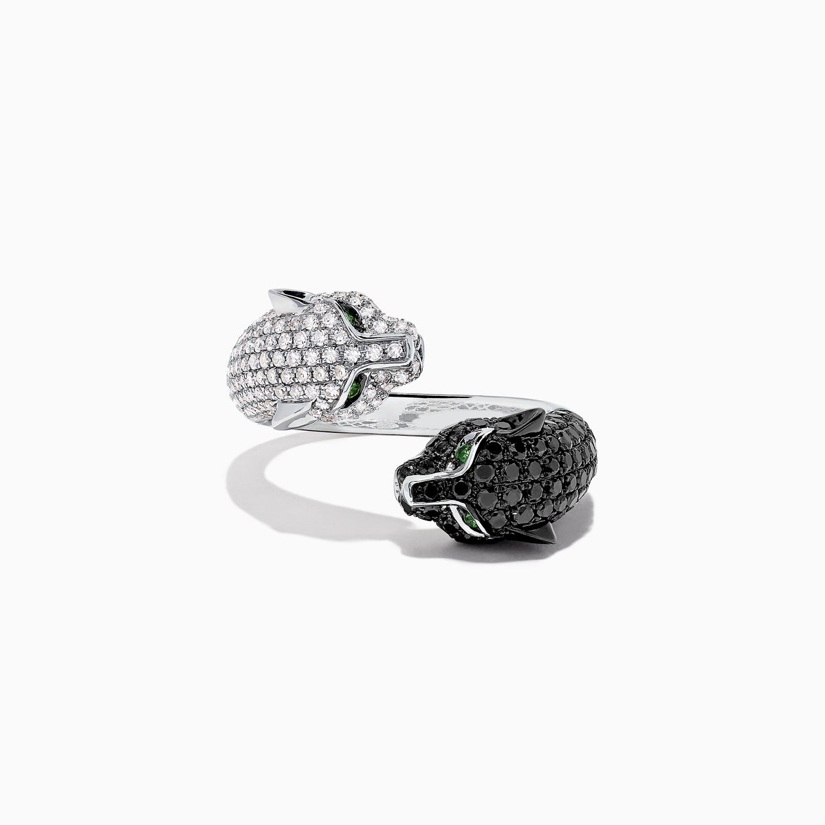 The Signature 14K Gold Black & White Diamond Double Panther Ring, 1.49 TCW, features two panther heads—one with black stones, the other with white—each set with vivid green gemstone eyes.