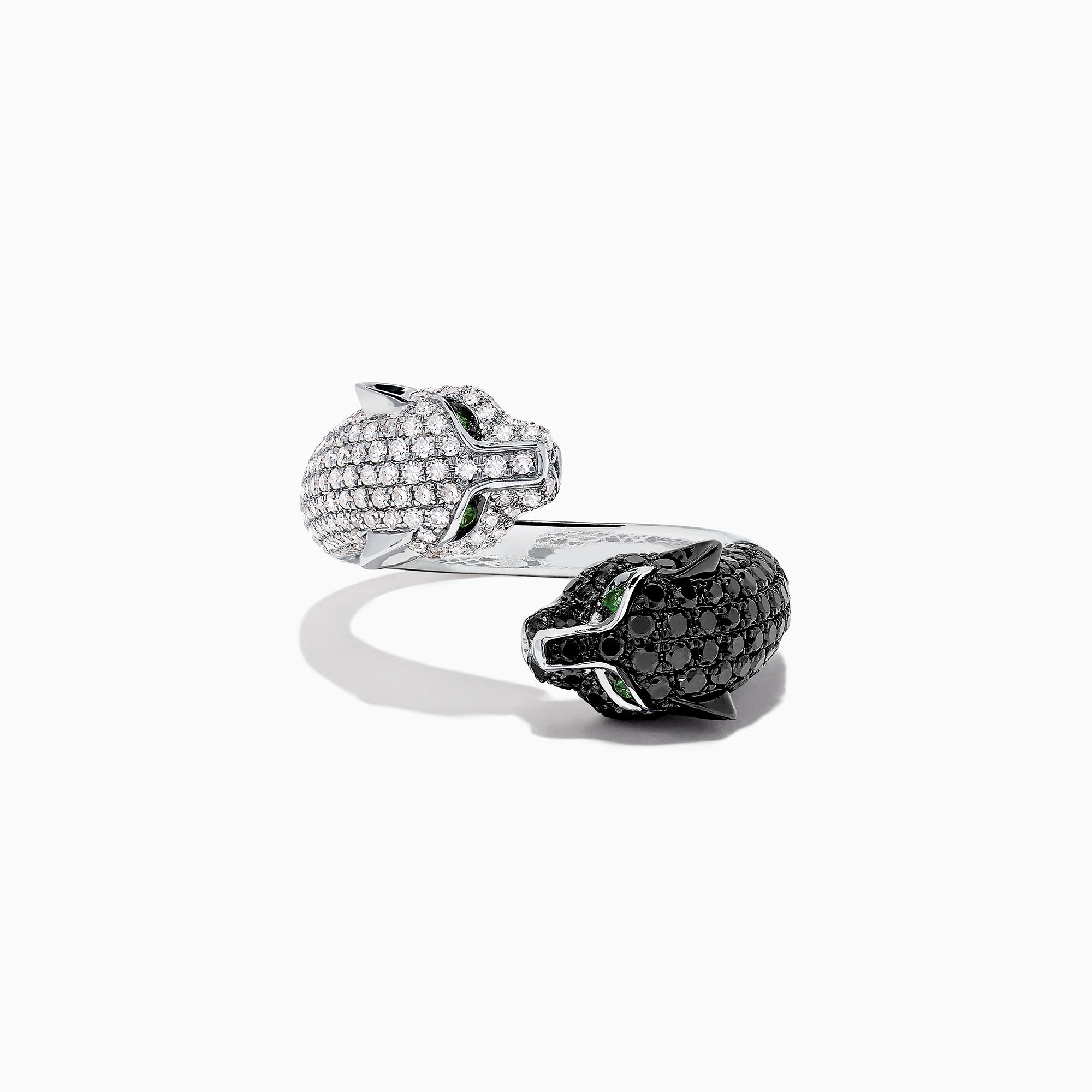 The Signature 14K Gold Black & White Diamond Double Panther Ring, 1.49 TCW, features two panther heads—one with black stones, the other with white—each set with vivid green gemstone eyes.