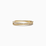 The DOro 14K Yellow Gold Cross Over Diamond Band features a twisted rope design with 0.11 TCW diamonds along one side, displayed on a plain white background.