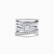 The Pave Classica 14K White Gold Diamond Ring, 1.12 TCW, features a round center diamond encircled by smaller diamonds and pavé-set stones on crisscrossing bands for added sparkle.