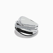 The Caviar 14K White Gold White and Black Diamond Crossover Ring features overlapping bands, some accented with white and black diamonds, creating a striking crisscross pattern against a pristine white gold setting.