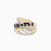 The Signature 14K Yellow Gold Diamond Spot Crossover Ring features yellow gold bands with a leopard print of white, black, and brown diamonds in crossover style, accented by baguette and round-cut stones for added sparkle.