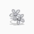 The 14K White Gold Diamond Multi Flower Ring features two overlapping flower designs with petals set with rectangular and round white diamonds, displayed against a plain white background.