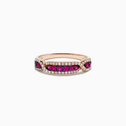 The Ruby Royale 14K Rose Gold Pave Ruby and Diamond Band features a row of round rubies bordered by sparkling white diamonds in a geometric pattern, offering an elegant, symmetrical look reminiscent of a classic diamond band.