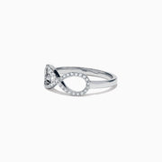 14K White Gold Diamond Infinity Pinky Ring, 0.13 TCW, features a diamond-studded infinity symbol design and is displayed on a white background.