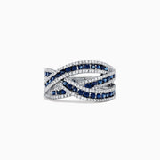 The Royale Bleu 14K White Gold Sapphire and Diamond Crossover Ring, 1.43 TCW, showcases three intertwined bands with alternating blue sapphires and white diamonds for a sophisticated, woven look.