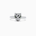 The Signature 14K White Gold Diamond and Tsavorite Panther Ring (0.25 TCW) features a sparkling panther head with diamond accents and vivid green tsavorite eyes, set against a plain white background.