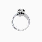 The Signature 14K White Gold Diamond and Tsavorite Panther Ring, 0.25 TCW, showcases a panther’s head with vivid green tsavorites for eyes and black stones on the face, elegantly set in white gold.