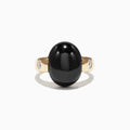 A Limited Edition Men’s 14K Yellow Gold Onyx and Diamond Ring, 15.49 TCW, features a large smooth black onyx centerpiece flanked by small round diamonds, shown against a plain white background.