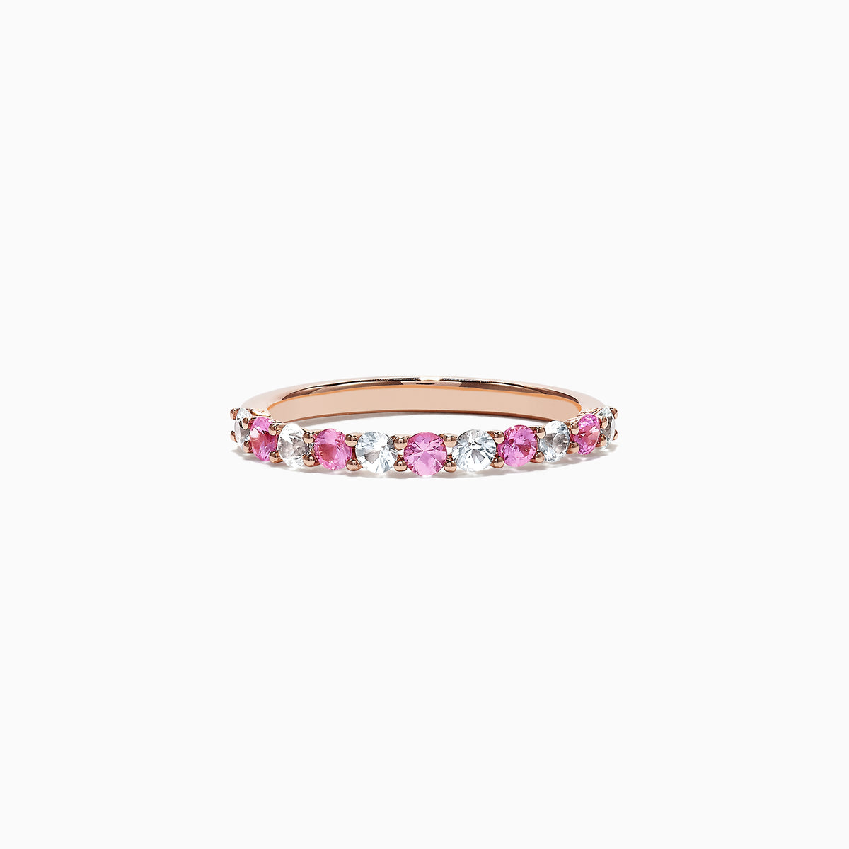 The 14K Rose Gold Pink and White Sapphire Band Ring, 0.94 TCW, showcases alternating pink and white sapphires set in a continuous row around the band, displayed against a white background.