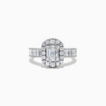 The Classique 14K White Gold Diamond Ring, 1.21 TCW, showcases an emerald-cut center diamond with a halo of round diamonds and baguette accents, set in luxurious 14K white gold against a white background.