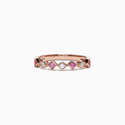 The 14K Rose Gold Pink Sapphire and Diamond Band Ring, 0.27 TCW, showcases alternating pink sapphires and diamonds in a repeating diamond-shaped pattern around the band.