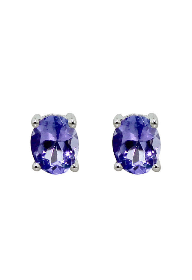 A pair of 14K white gold oval tanzanite stud earrings, 0.65 TCW, shown on a white background.