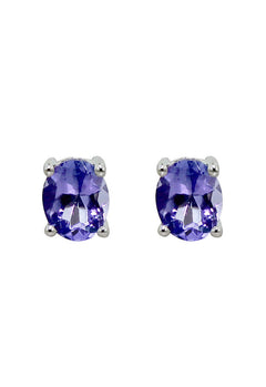 A pair of 14K white gold oval tanzanite stud earrings, 0.65 TCW, shown on a white background.