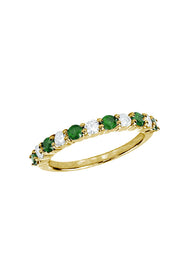 The Gemma Emerald and Diamond Ring features alternating round green emeralds and white diamonds in a continuous pattern, totaling 0.73 TCW.