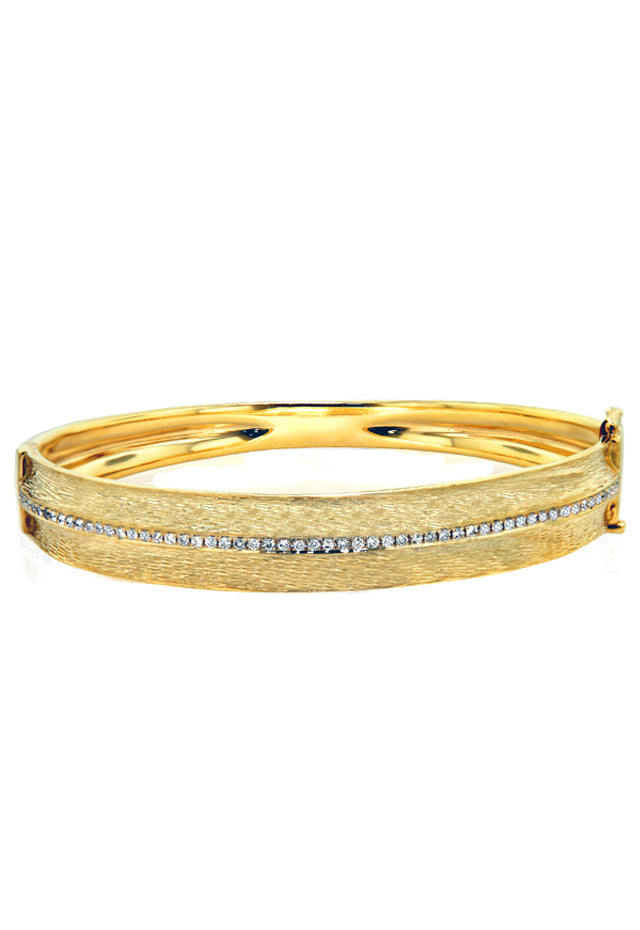 The DOro 14K Yellow Textured Gold Diamond Bangle features a central row of sparkling diamonds totaling 0.56 carats set in a textured yellow gold design.