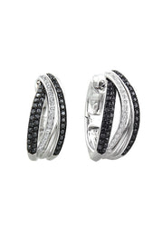These 14K White Gold Black and White Diamond Earrings (.71 TCW) feature three overlapping silver hoops—two with black stones, one with clear—for a sophisticated, stylish look.
