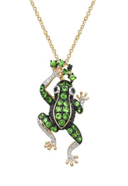 The Safari 14K Yellow Gold Tsavorite Frog Pendant, 1.13 TCW, features detailed limbs, expressive eyes, and sparkling green and black gemstones on a whimsical pendant holding a smaller frog above its head.