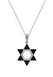 A striking Effy Novelty 14K gold Star of David pendant features 0.29 TCW black and white diamonds set in a hexagonal open design.